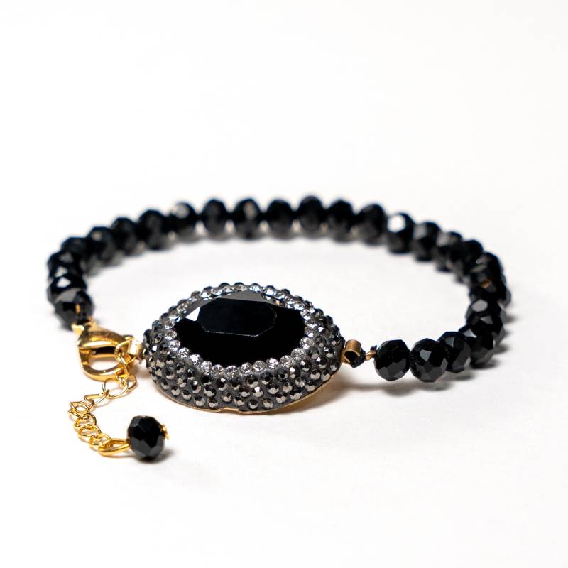 Handcrafted Grania bracelet featuring a strand of black beads with a sparkling black zirconia stone centerpiece - Anima Collection by Iottigleam
