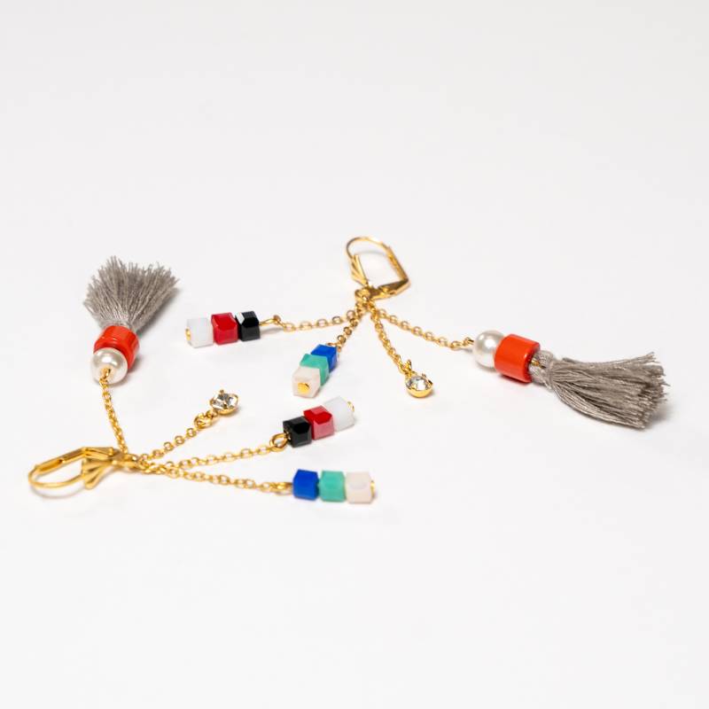 Handcrafted Caliona dangling earrings featuring colorful beads and a single tassel on long, fluid strands - Anima Collection by iottigleam
