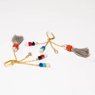 Handcrafted Caliona dangling earrings featuring colorful beads and a single tassel on long, fluid strands - Anima Collection by iottigleam