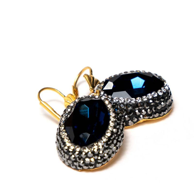 Handcrafted Daphne earrings featuring a faceted navy blue zirconia crystal with deep oceanic reflections - Anima Collection by iottigleam