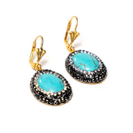 Handcrafted Devi oval earrings featuring an elongated vibrant turquoise stone with natural veining - Anima Collection by iottigleam