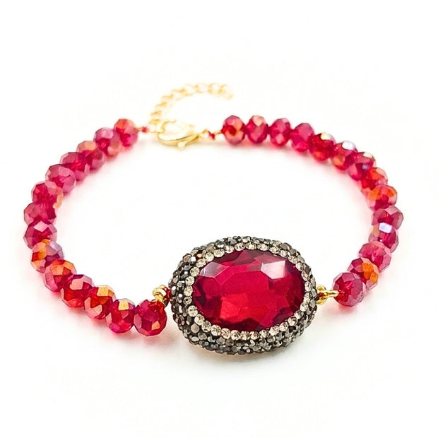 Handcrafted Grania II bracelet featuring high-shine red beads and a brilliant centered red zirconia stone - Anima Collection by iottigleam