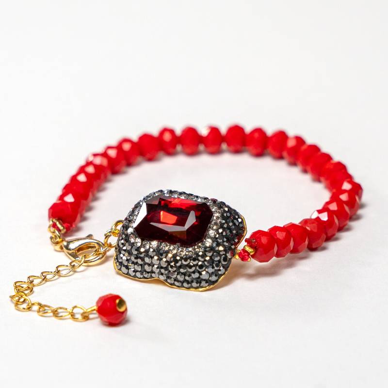 Handcrafted Grania bracelet featuring red matte beads with a centered, rectangular-cut red zirconia stone - Anima Collection by iottigleam