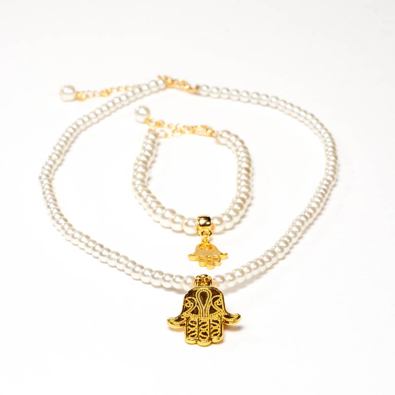 Handcrafted Hamsa accessory set featuring a glass pearl bead choker necklace and matching bracelet with Hamsa hand charms - Anima Collection by iottigleam