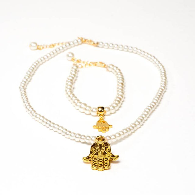 Handcrafted Hamsa accessory set featuring a glass pearl bead choker necklace and matching bracelet with Hamsa hand charms - Anima Collection by iottigleam