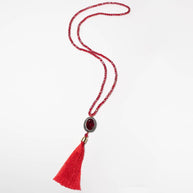 Handcrafted Idony necklace featuring a brilliant red zirconia center stone and matching vibrant red beads - Anima Collection by Iottigleam
