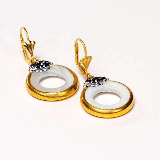 Handcrafted Iris I earrings featuring a natural sea shell stone encased in a polished gold-plated frame - Anima Collection by iottigleam
