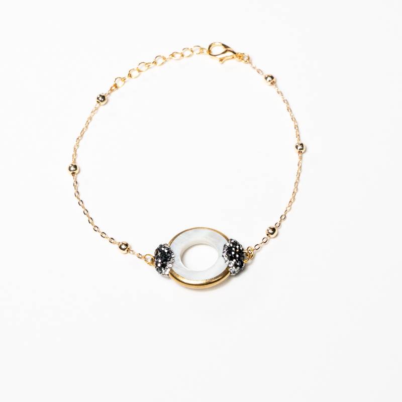 Handcrafted Iris II chain bracelet featuring a radiant natural sea shell centerpiece on a high-shine gold-plated link chain - Anima Collection by iottigleamchain.