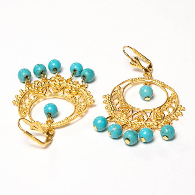 Maglei gold-plated artisanal earrings featuring intricate turquoise stone ornaments and textured detailing - Anima Collection by iottigleam