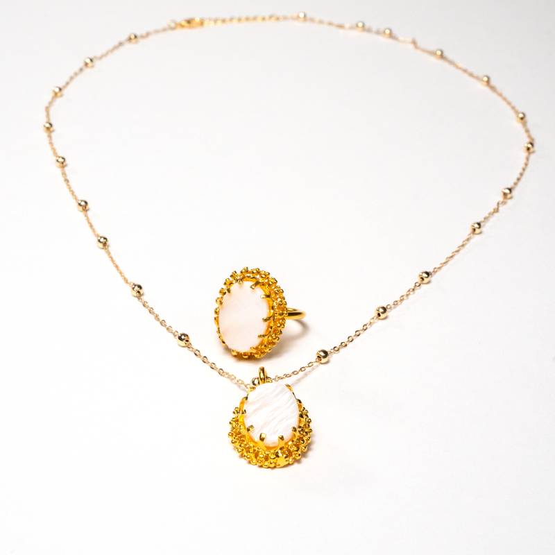Handcrafted Zarina accessory set featuring a gold-plated necklace with a framed mother of pearl pendant and a matching mother of pearl ring - Anima Collection by iottigleam