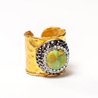 Handcrafted Zorya Green African Turquoise ring with round green African Turquoise stone and natural dark speckles on a gold-plated band - Anima Collection by Iottigleam